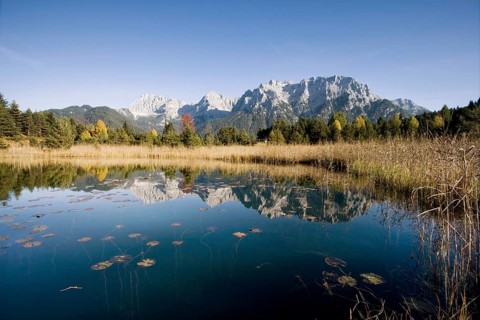 The Northern Karwendel chain in autumn reflected in Luttensee