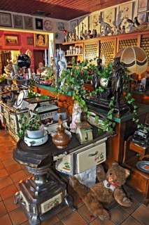 Various old stoves and knick-knacks in a private collection