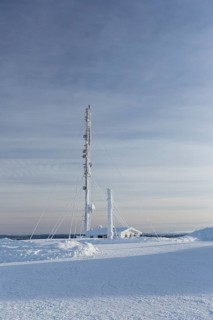Snow-covered radio tower