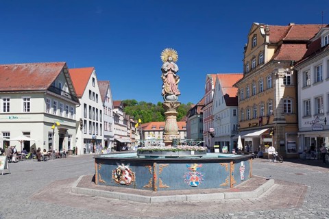 Madonna with a crescent moon on the Marienbrunnen fountain on Marktplatz square