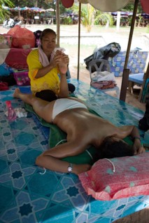 Traditional Thai massage at a beach