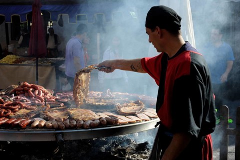 Cook handles giant barbecue at the annual All Saints Market in Cocentaina