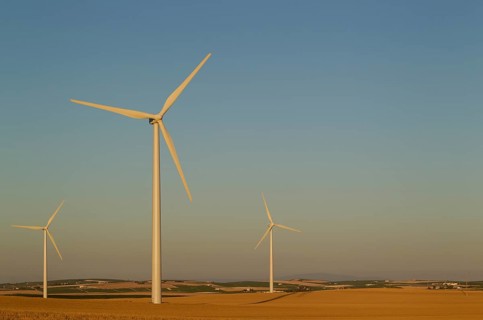 Windmills in the evening light on a wind farm near Sanlucar de Barrameda
