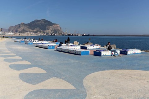 Colourful benches by the sea