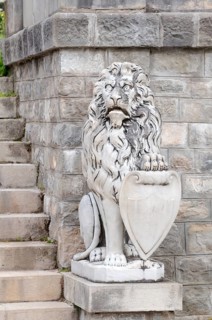 Sculpture of a lion in front of PeleÈ™ Castle