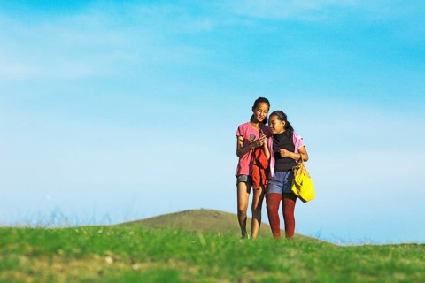 Girls with their mobile phones in the hills of Khakhorin