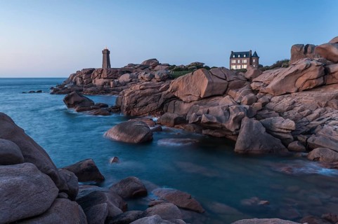 Bay with house and lighthouse