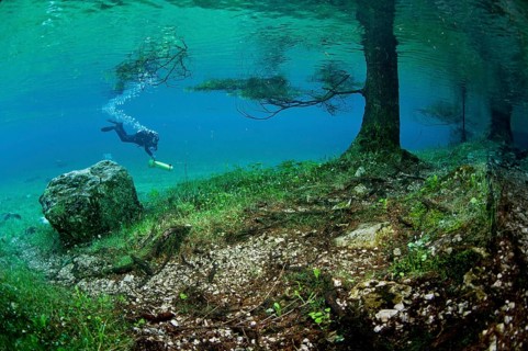 Scuba diver with a scooter