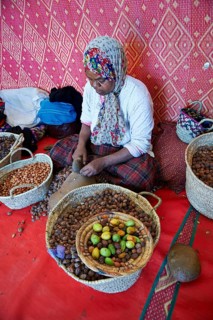 Women cracking argan nuts at the Cooperative Marjana