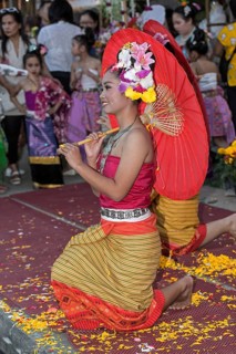 Young woman during a performance with a parasol