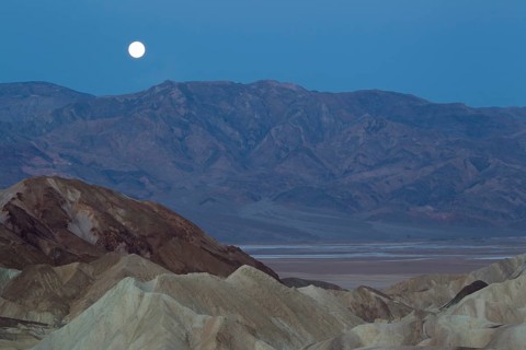 Full moon over the Panamint Range and the Death Valley at dawn
