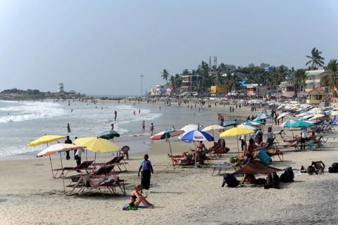 Tourists on the beach of Kovalam