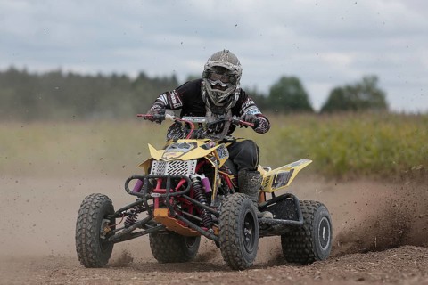 Quad rider on a field