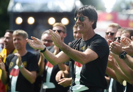 Joachim Low celebrates with fans