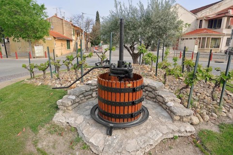 Old wine press in a roundabout