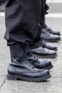 Members of a right-wing Hungarian party wearing combat boots
