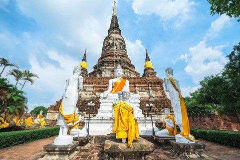 Buddha statues in front of the stupa at Wat Yai Chai Mongkhon