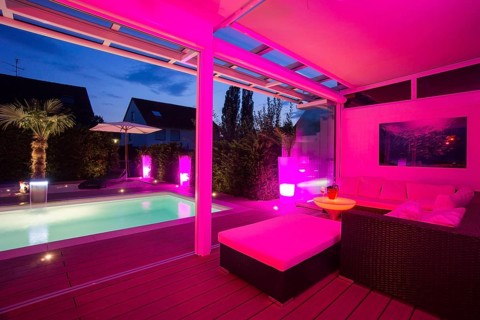 Private house at night with light show