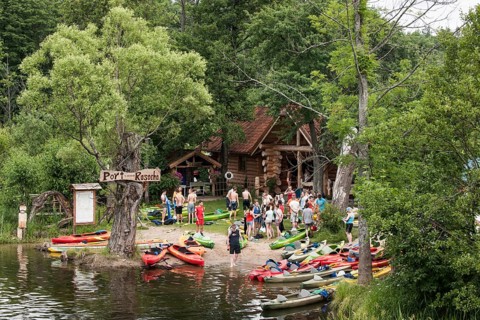 Tourists at a boat rental place at the Krutynia River