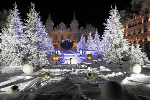 Christmas decorations with white fir trees on the square in front of the Monte Carlo Casino