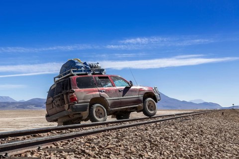 Car crossing railroad tracks