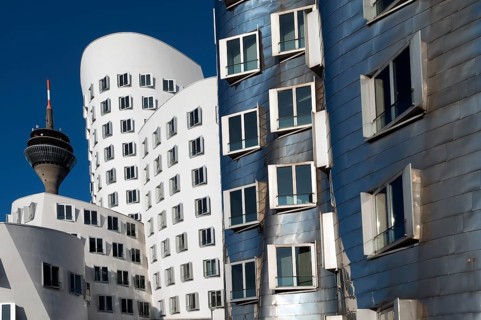 The Rheinturm tower and the Gehry buildings or Neuer Zollhof at Medienhafen