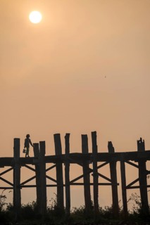 Locals on a teak bridge
