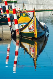 Moliceiro boat anchored on a canal