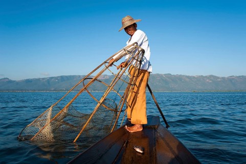 Fishermen with a traditional basket