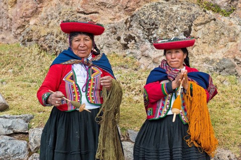 Two elderly women wearing hats