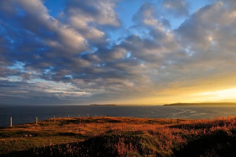 Atmospheric clouds at sunset near Hoxa Head