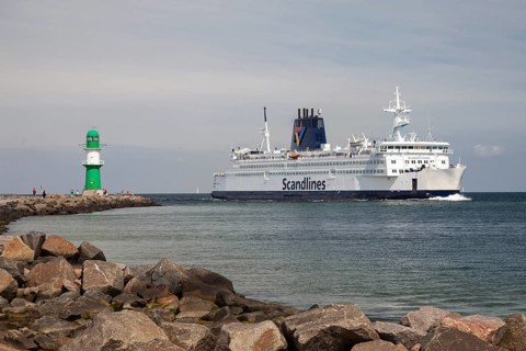 Lighthouse and the Scandlines ferry 'Kronprins Frederic'