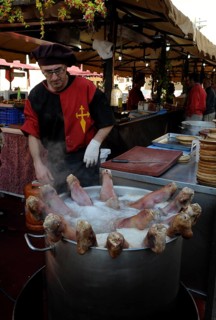 Pigs' feet boiling in a large pot at the annual All Saints Market in Cocentaina
