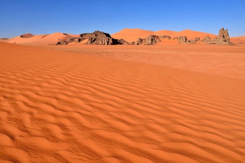 Sand dunes and rocks at Tin Merzouga