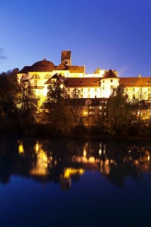 Hohes Schloss castle reflected in river Lech