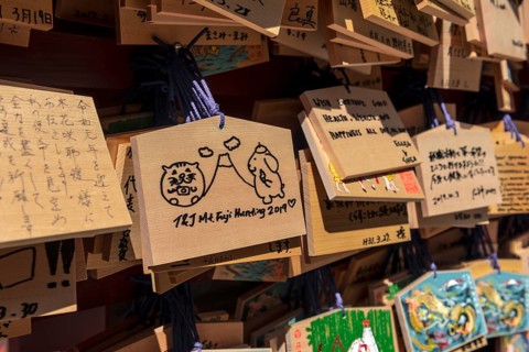 Written wishes to deities on small wooden boards