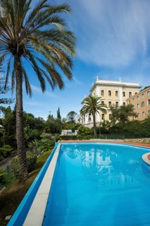 Swimming pool in front of villa