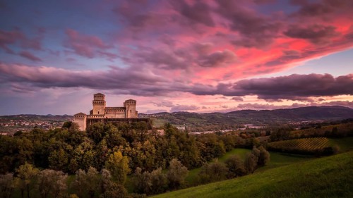 Torrechiara Castle or Castello di Torrechiara at dusk