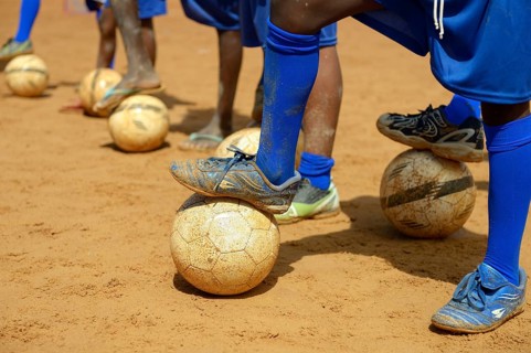 Feet of Brazilian children with balls