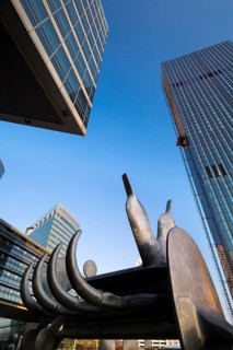 Modern sculpture from the Strabag Kunstforum art gallery in front of the Tech Gate Vienna and DC-Tower buildings