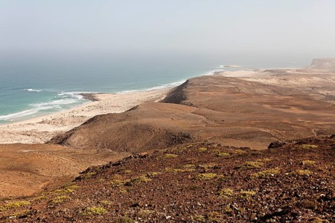 View from the black Mountain Morro Negro down the coast to the south with Praia Mosquito Beach on the east coast