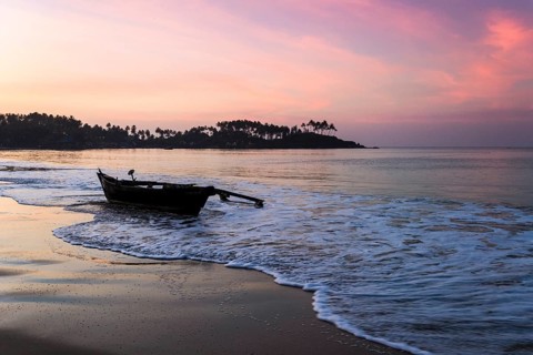 An old fishing boat on Palolem Beach