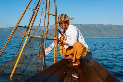 Fishermen with a traditional basket