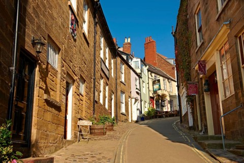 Narrow street of the historic fishing village of Robin Hood's Bay