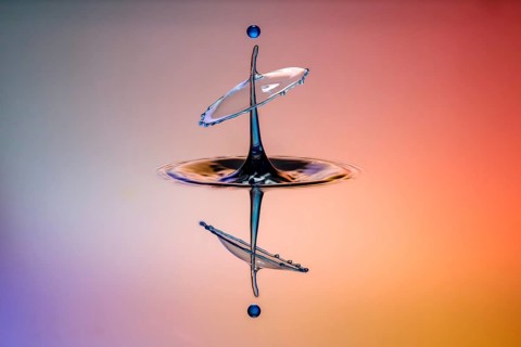 Three drops collide