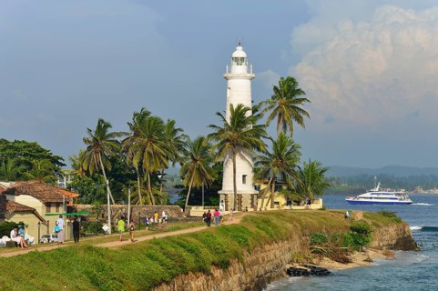 View of the fortification wall and the lighthouse