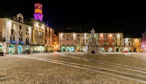Piazza Cavour with the illuminated Torre the Angel or Angel Tower