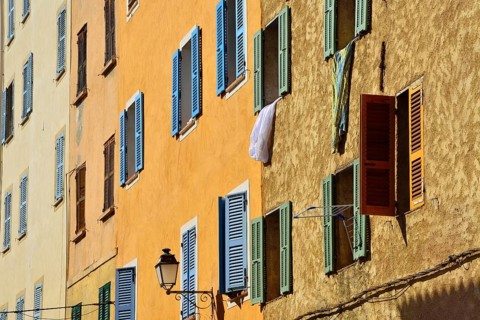 Row of houses with colourful shutters