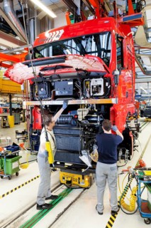 Employees assembling the chassis