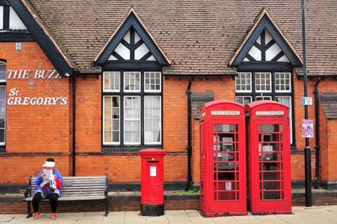 Red telephone booths and a red post box